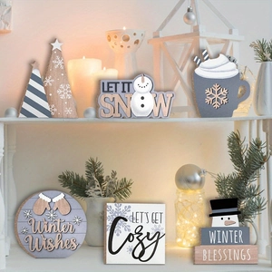 Detailed view of 7-piece wooden winter tray decor featuring snowmen and holiday signs