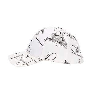 Detail of Eiffel Tower sketch and Bonjour print on a white cotton baseball cap