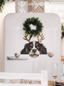 Peeking Cavalier King Charles Spaniel with gold antlers wall decal on a fridge