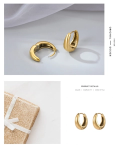 Detailed view of chunky gold hoop earrings with polished finish and elegant gift box