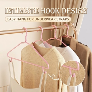 Pink non-slip plastic clothes hanger with inner hooks for camisoles and knits