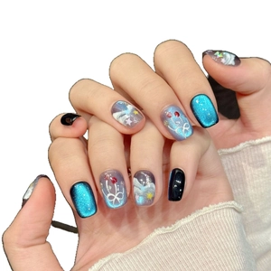 Short blue cat eye press-on nails with aurora wave and hand-painted cloud designs