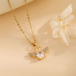 Golden crown wing pendant necklace featuring a central clear gem and sparkly crystal accents