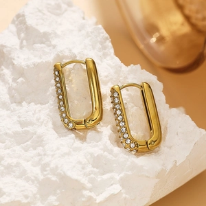 Golden U-shaped rectangular hoop earrings with side-set white zircons on white stone