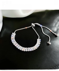 Adjustable silver bracelet with baguette-cut sparkling cubic zirconia stones