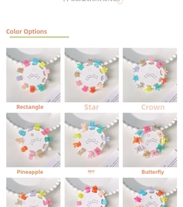 Detailed view of mini macaron hair clips in star, heart, and crown shapes for kids