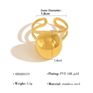 Macro detail of 18K gold plated stainless steel ball ring with 1.4cm sphere diameter