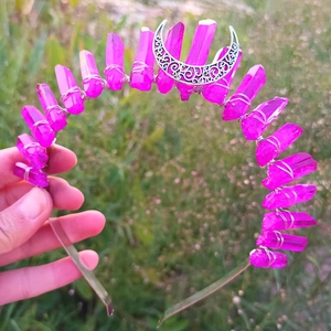 Pink quartz crystal wicca headband with silver crescent moon pendant on outdoor lawn