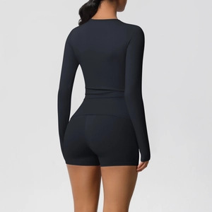Close-up of the back view showing brushed fabric texture of the black yoga set