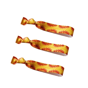 Set of 3 elastic softball hair ties in yellow with red stitching design used as wristbands