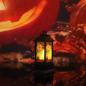 Retro Halloween lantern with LED flickering flame and ghostly silhouette patterns
