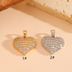 Elegant gold and silver heart-shaped pendant necklaces with sparkling crystal rhinestones