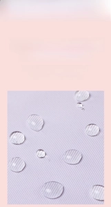 Detail view of water repellent light purple fabric with droplets showing wear resistance