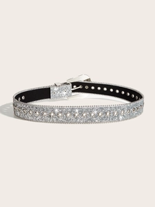 Detail of silver rhinestone belt featuring shimmering sequins and a metallic buckle design
