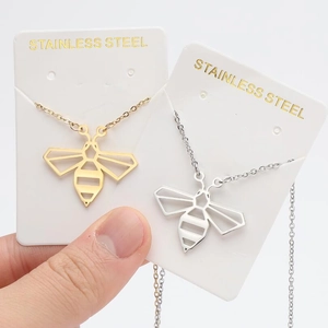 Minimalist hollow bee pendant necklace in gold and silver finish stainless steel