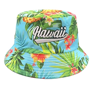 Light blue bucket hat with tropical fruit pattern and 3D Hawaii letter embroidery