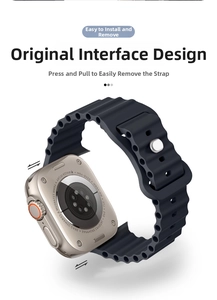 Detail showing the quick-release interface of the black silicone ocean watch strap