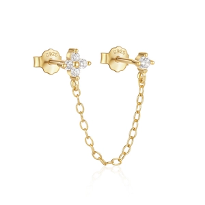 Detail of S925 sterling silver chain earrings with clover flower and sparkling zircon stones