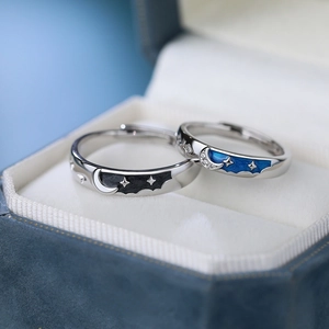 Elegant S925 sterling silver star and moon couple rings in a blue velvet gift box