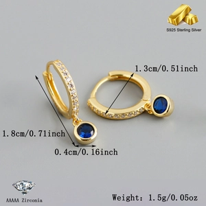 Detail view of S925 sterling silver hoop earrings with cubic zirconia and blue stone