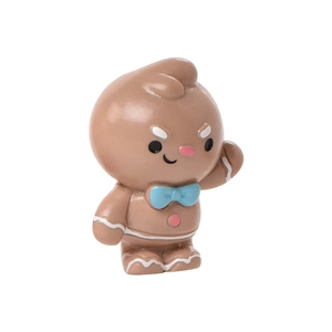 Cute gingerbread man micro landscape decoration with blue bow tie on white background
