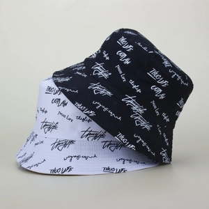 Graffiti embroidered bucket hat in black and white featuring street style lettering
