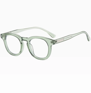 Detail of round frame sunglasses showing green transparent material and inner metal core
