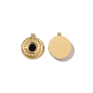 Detailed view of gold heart pendants with black stone inlay and sunburst texture