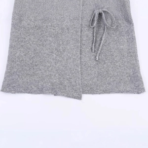 Gray knitted coat featuring a minimalist wrap design with adjustable tie waist detail