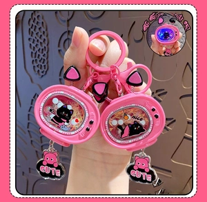Pink cartoon TV keychain featuring a cute black cat design with internal glowing lights