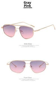 Macro detail of pilot sunglasses with gold metal frame and grey-pink gradient lenses