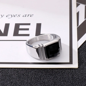 Vintage men's stainless steel ring featuring a square black gemstone and grooved design