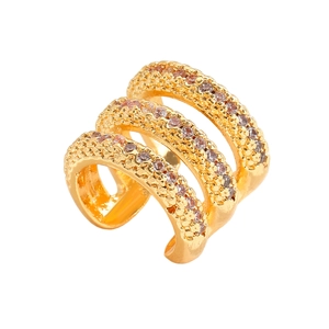 Detail of three-row gold ear cuff with pink zircons in a non-pierced C-shaped design