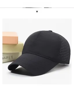Detail of breathable black mesh baseball cap with side perforations and curved brim