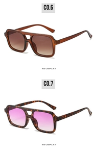 Close-up of square double-bridge sunglasses in brown and tortoise shell frames at 45-degree angle