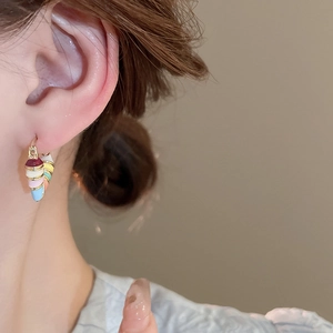 Colorful enamel striped heart hoop earrings in gold finish for a stylish minimalist look