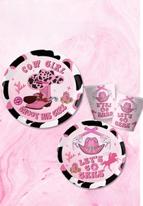 Pink cowgirl party plates and cups featuring cow print edges and western motifs