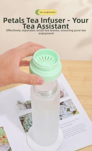 Detailed close-up of the petal-shaped tea infuser and filter on a frosted plastic cup