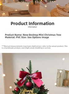 Close-up of a mini tabletop Christmas tree with PVC branches, LED lights, and ornaments