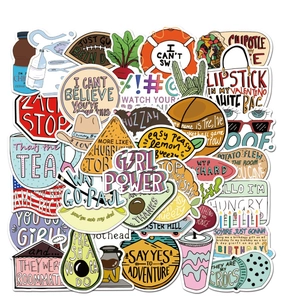 Flat lay of multiple VSCO vinyl waterproof stickers for luggage and laptops