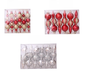 Detailed view of assorted Christmas gourd ball ornaments in gold, red, and silver finishes