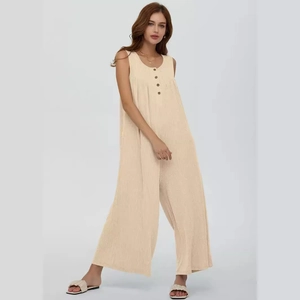 Beige sleeveless wide-leg jumpsuit in ribbed knit fabric with button detail