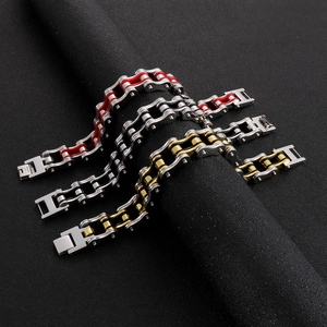 Detailed close-up of heavy industrial bike chain bracelets in three metallic finishes