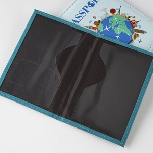 Detailed interior of teal passport holder with transparent pockets and UV printed map