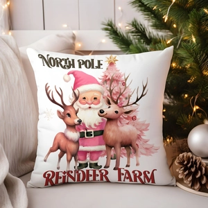 Pink Christmas pillow cover with Santa and Reindeer at home interior setting