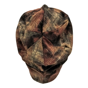 Detail shot of vintage tie-dye slouchy beanie showing knitted fabric texture and seam