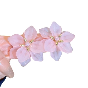 Pink floral stud earrings with frosted resin petals and elegant artificial pearl center