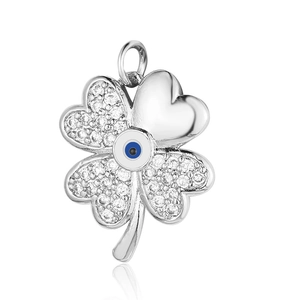 Detailed view of silver clover pendant with blue devil eye and clear cubic zirconia