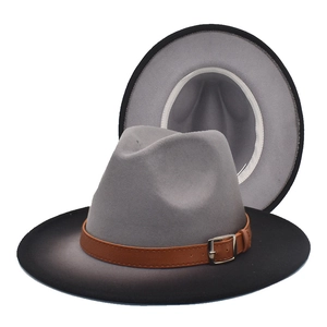 Detail view of ombre wool fedora with brown faux leather band and metallic buckle