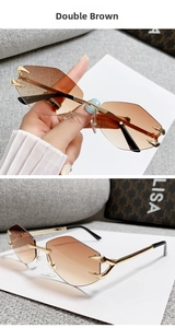Detail of rimless polygon sunglasses with brown gradient lenses and gold claw accents